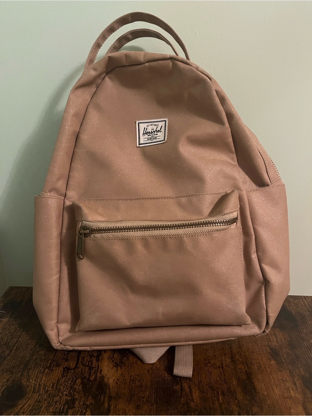 Herschel tan mini backpack